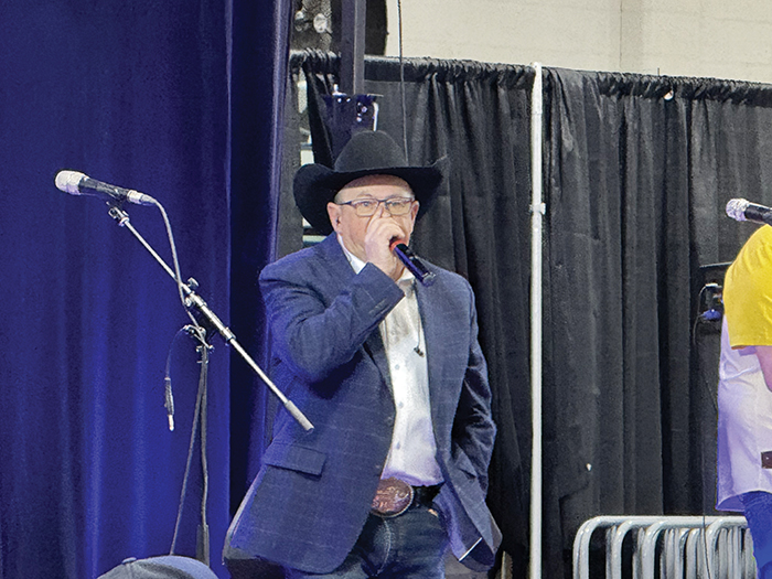 Ward Cutler, a world renowned auctioneer, came to his 26th supper and auction.